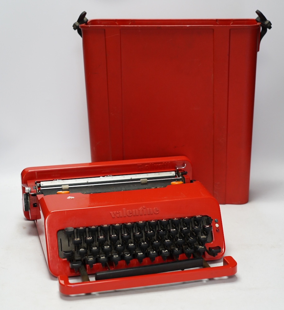 An Olivetti Valentine portable typewriter, designed by Ettore Sottsass & Perry, in its case. Condition - fair, some wear and scuffing to the plastic body and case